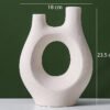 Beige ceramic vases