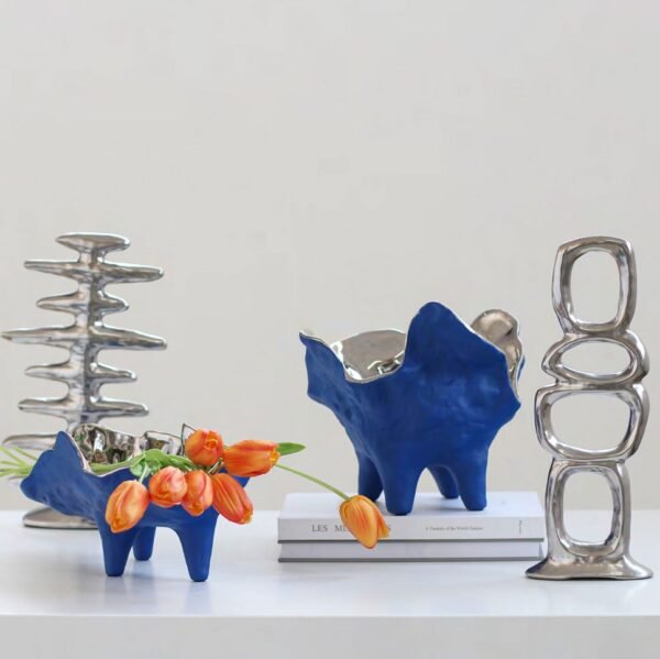 silver and navy ceramic vase