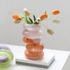 Light purple transition to orange glass vase