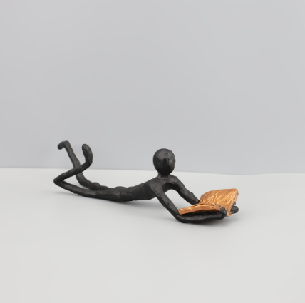 Lying on floor sculpture