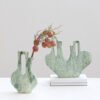 Green and beige vases