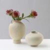Beige ceramic vases